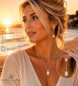 Description complète  Inspirées par la lumière dorée des couchers de soleil sur la côte landaise, les boucles d’oreilles Éléganc